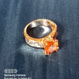 Elegant Sterling Silver and Rose Gold Ring with Orange Gemstone